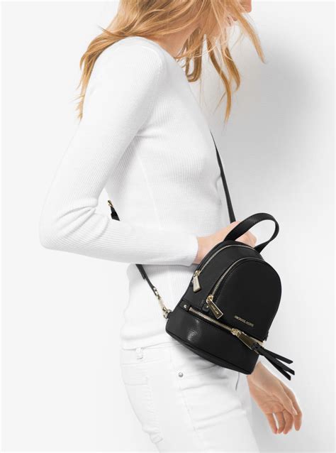 michael kors mini leather backpack.